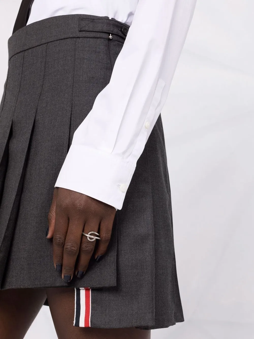 dropped back mini pleated skirt
